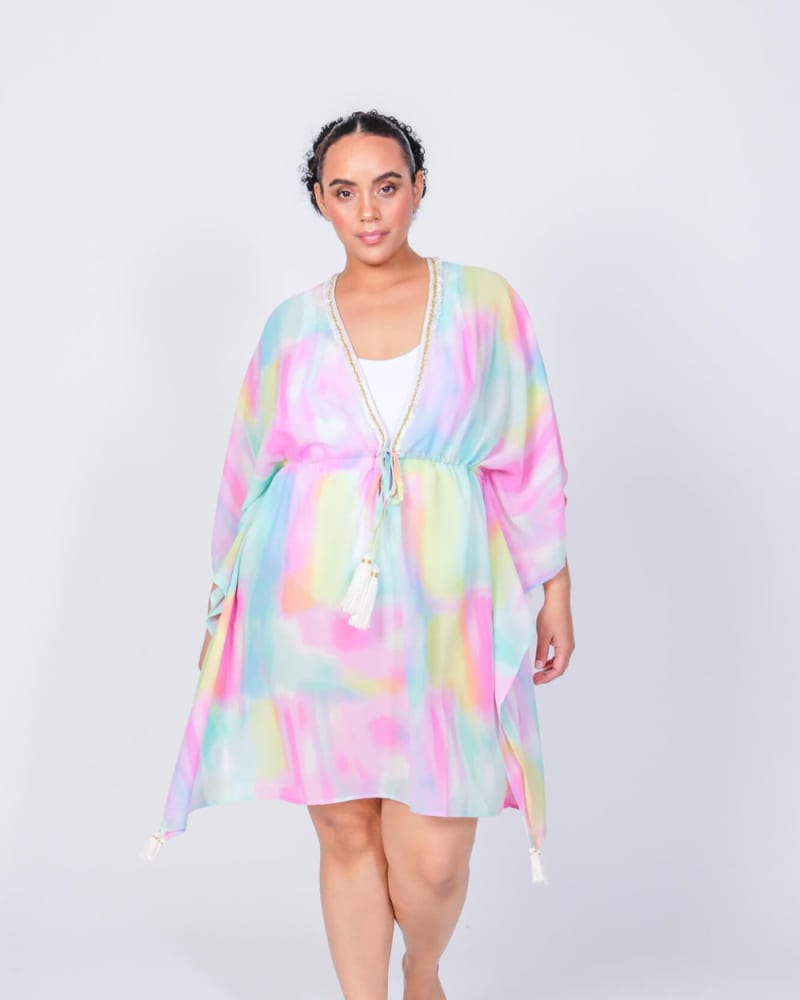 Front of a model wearing a size L Flowy Sweets Cover Up in Watercolor Tie Dye by LuvMeMore. | dia_product_style_image_id:266734